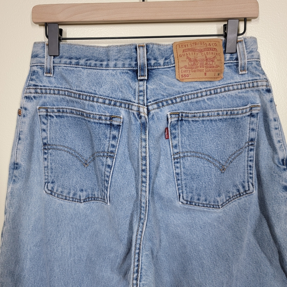 Vintage Levi's 550s size 14 mom jeans faded blue high rise straight leg